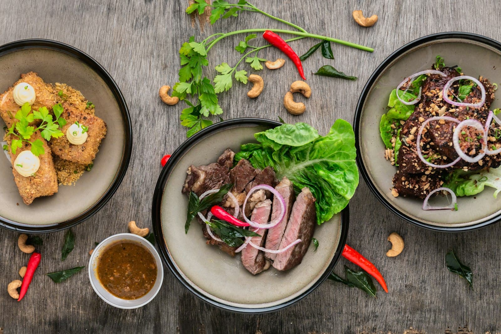 Styled spread of plated food and coffee on a table